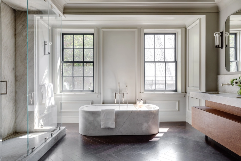 Materials Specified for the Site - Primary bath with marble tub surround and herringbone oak floor