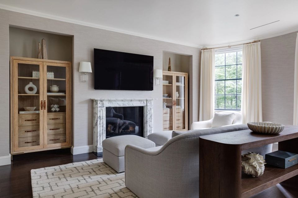 A Philosophy of Custom - Beacon Hill living room with carved marble mantel and built-in cabinetry